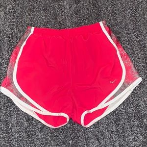 Pink NIKE track shorts